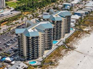 an overhead view of a building with blue roofs at Steps to the beach and amazing views! in Panama City Beach
