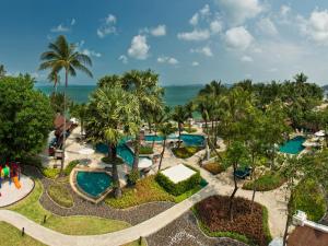 an aerial view of a resort with two pools at Hotel Ibis Samui Bophut in Bophut