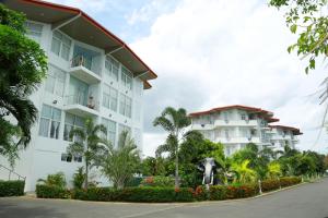 a building with an elephant statue in front of it at Hotel East Lagoon in Batticaloa