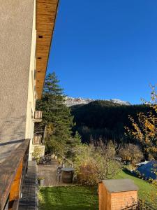 a view from the balcony of a house at La Moraine in Villard-de-Lans