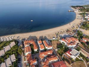 an aerial view of a beach with houses and the ocean at Golden Beach, Gerakini in Gerakini +7 photos
