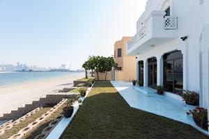 a view of the beach from a hotel at Palm Jumeirah - Property Advisers in Dubai