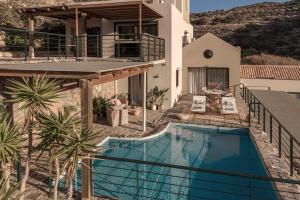 an image of a house with a swimming pool at Istron Luxury Villas in Istro