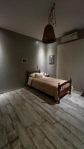 a bedroom with a large bed in a room at Casa Azahares in Yerba Buena +9 photos