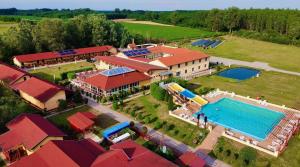 an aerial view of a resort with a swimming pool at Furó Vendégház in Fülöp