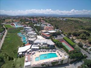 an aerial view of a resort with a swimming pool at Rethymno Mare & Water Park in Rethymno