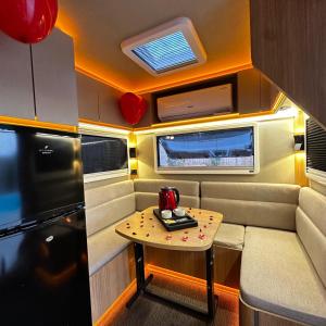 a small table in the back of an rv at Vadi Karavan Otel in Buca