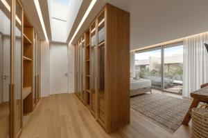 a hallway of a house with a large window at Lagoon Residence 56 Deluxe in Óbidos
