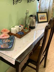 a table with a table cloth on top of it at Udai Niwas - Bikaner in Bikaner