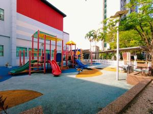 a playground in front of a building at peacehome 13a in Cyberjaya