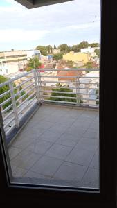 a view of a balcony with a white fence at Catalina in Viedma