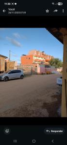 a view of a car parked in a parking lot at AjuruLima in Bragança