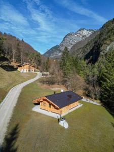 an overhead view of a house in the mountains at Baita Valon La Piciola in Stenico +7 photos