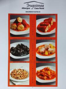 a collage of four pictures of plates of food at Albergue Irugoienea in Espinal-Auzperri