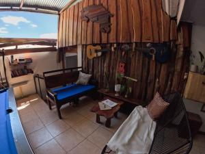 an overhead view of a living room with a couch and a table at La Posada - Hostel in Santa Teresa Beach