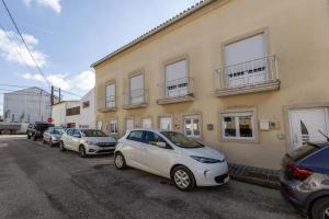 a row of cars parked in front of a building at Ferrel Dreams in Ferrel