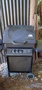two bbqurgers sitting next to each other at The Clearing - Rustic Wagon by the Sea in Picton