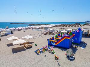 an overhead view of a beach with a playground at Royal by Euxin in Constanţa