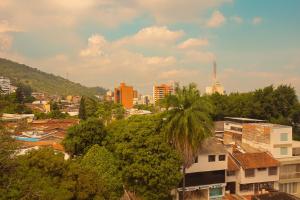 a view of a city with buildings and trees at Riviera Hotel Boutique in Cali