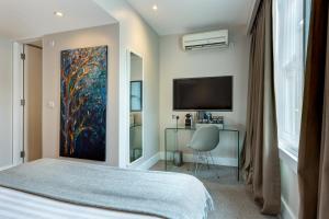 Ένα ή περισσότερα κρεβάτια σε δωμάτιο στο Hotel 55