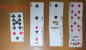 a group of four playing cards and poker chips at Le volte di Umberto Tramontana in Sogliano Cavour