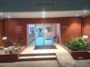 an entrance to a building with a revolving door at Beach-side condos at Turtle Beach Towers in Ocho Rios +41 photos