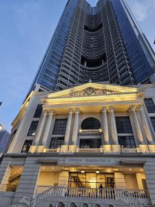 a view of a building with a large skyscraper at 35th Prime Staycation BGC in Manila