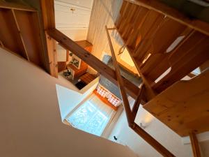 an overhead view of a staircase in a house at Villa Apartments in Palanga