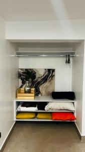 a room with shelves with different colored cushions at Casa Niagara in San Antonio