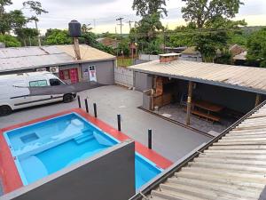 an overhead view of a house with a swimming pool at jazmin apart iguazu in Puerto Iguazú
