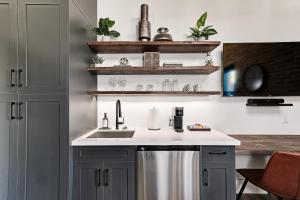 a kitchen with a sink and a counter at The Brick & Beam Boutique Hotel in Collingwood