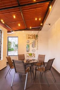 a dining room with a table and chairs at Residencia G in Champotón +29 photos