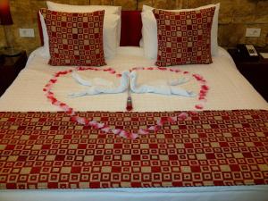 Letto o letti in una camera di Monoberge Hotel