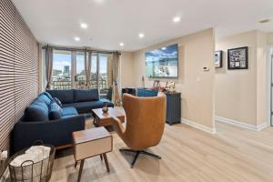 a living room with a couch and a chair at Willow Estates Harborplace in Baltimore