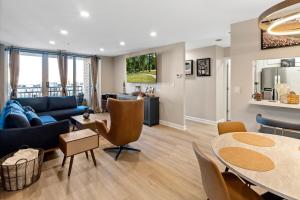 a living room with a couch and a table at Willow Estates Harborplace in Baltimore
