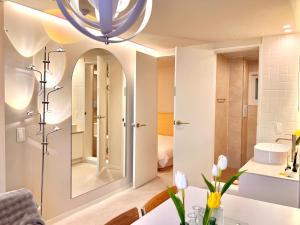 a bathroom with a large mirror and a dining room at Stay BUT SEONGSU in Seoul +137 photos