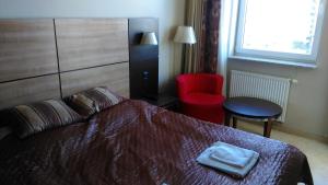 Posteľ alebo postele v izbe v ubytovaní ApartamentyPrzyMorzu Diva 553