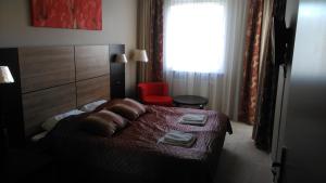 Posteľ alebo postele v izbe v ubytovaní ApartamentyPrzyMorzu Diva 553