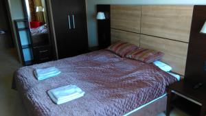 Posteľ alebo postele v izbe v ubytovaní ApartamentyPrzyMorzu Diva 553