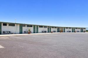 an empty parking lot in front of a building at Highway One Motel in Ceduna