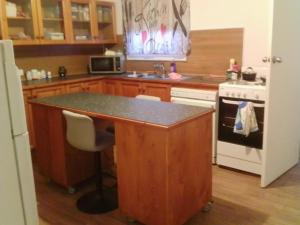 a kitchen with a counter and a sink and a stove at Dream Catcher Air B&B in Berri