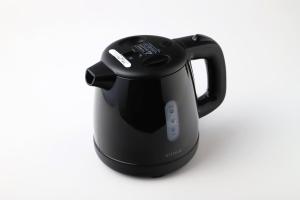 a black tea kettle on a white background at Smile Hotel Aomori in Aomori