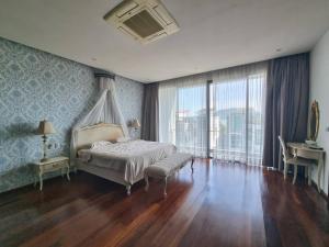 a bedroom with a bed and a large window at Luxury Villa with Panoramic Seaview, Private Pool in Ban Saiyuan (1) +26 photos