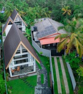 an overhead view of a house with solar panels on the roof at Gone4Coastal - Cabana in Hikkaduwa