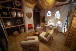 an overhead view of a living room with a fireplace at Spa Bali in Arques