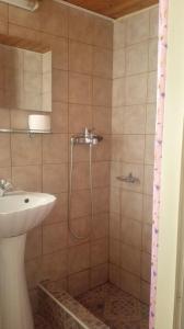 Kylpyhuone majoituspaikassa Hotel Ionion