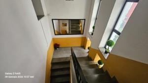 a view of a staircase in a building at Hotel Antigone in Tirana