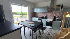 a kitchen with a table and a table and a tableablish at U Casetta in Rignac