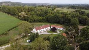 an aerial view of a large house in a field at Chez Claire et Olivier in Nabringhen