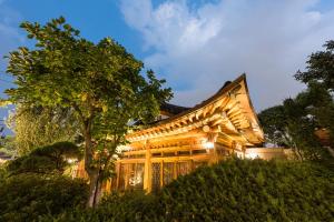 Un jardín fuera de Bonum 1957 Hanok and Boutique